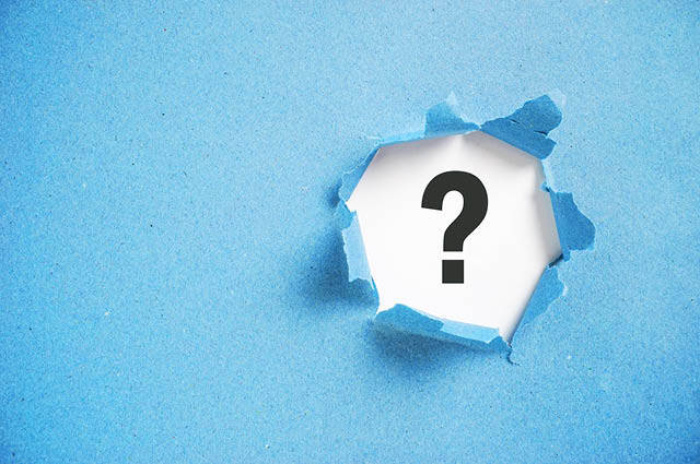 A blue paper with a hole torn in the center, revealing a white background and a large black question mark in the middle. A blue paper with a hole torn in the center, revealing a white background and a large black question mark in the middle.